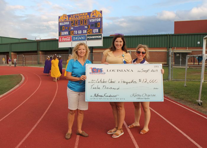 Lutcher Cheer Check for $12,000